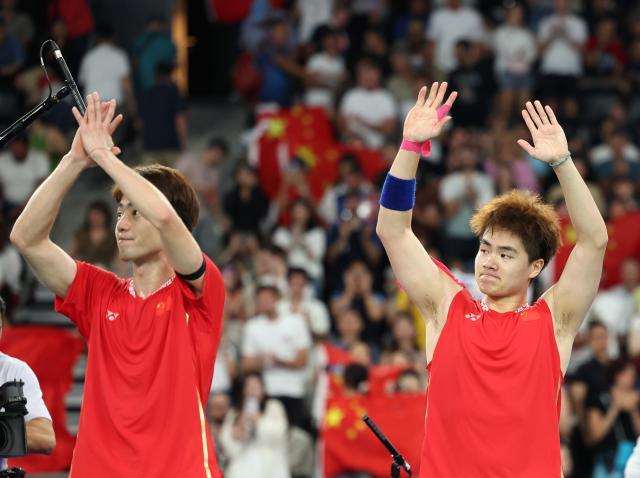 奥运首秀摘银,梁伟铿/王昶在遗憾中成长